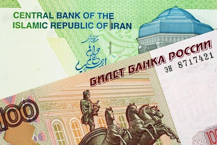 فوربس: گام‌های مهم ایران و روسیه برای حذف دلار و سوئیفت