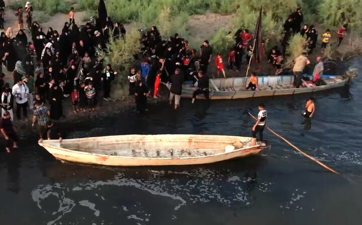 فیلم | زائران اربعین حسینی از رودخانه «دز» گذشتند