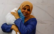 عزاداری زن فلسطینی، عکس خبری برگزیده سال شد + عکس